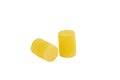 Yellow color ear plugs isolated on white background Royalty Free Stock Photo