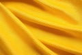 Yellow color football jersey clothing fabric texture sports wear background, close up