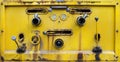 Yellow color old dirty of switch tool water pump on liquid tank Royalty Free Stock Photo