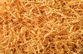 Yellow color shredded paper - gift box filler background. Royalty Free Stock Photo