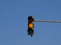 Yellow color on the traffic light with blue sky Royalty Free Stock Photo