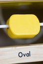 Yellow color Wooden toy to learn and play with shapes and color Royalty Free Stock Photo