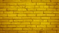 Yellow colored colorful damaged rustic brick wall brickwork stonework masonry texture background pattern blank design Royalty Free Stock Photo