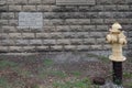 Yellow colored fire hydrant in the courtyard of the Old Joliet Prison in Joliet, United States