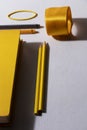 Yellow colored pencils with yellow cover book