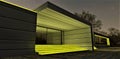 Yellow colour illumination of the concrete stairs on the porch of hte elite suburban dwelling. The walls finished with aesthetic Royalty Free Stock Photo