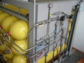 Yellow compressed natural gas cylinders