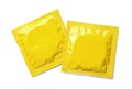 Yellow condom packages on white background, top view. Safe sex Royalty Free Stock Photo