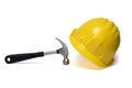yellow construction helmet claw hammer white background Royalty Free Stock Photo