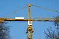 Yellow construction tower crane Royalty Free Stock Photo