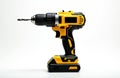 Yellow cordless drill with a bit inserted is ready for use. This power tool is isolated on a clean white background, perfect for Royalty Free Stock Photo