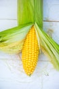 Yellow Corn Cob Closeup on White Background, Top View Royalty Free Stock Photo