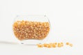 Yellow corn seed for popcorn in a glass bowl Royalty Free Stock Photo