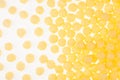 Yellow corn sticks balls on white background, pattern, top view. Royalty Free Stock Photo