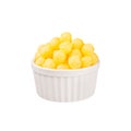 Yellow corn sticks balls in white ceramics bowl isolated on white background. Royalty Free Stock Photo