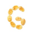 Yellow cornflakes letter G isolated on white background. Alphabet cereal flakes. Royalty Free Stock Photo