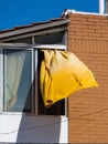 Yellow courtain in the wind Royalty Free Stock Photo
