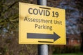 Yellow Covid 19 Assessment Unit Parking sign