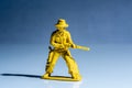Yellow cowboy plastic toy figure