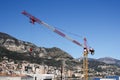 Yellow Crane with city in the background