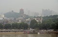 Yellow Crane Tower and other buildings nearly Yangtze river Royalty Free Stock Photo