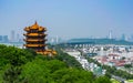 Yellow crane tower and Wuhan Yangtze Great Bridge scenic view in Royalty Free Stock Photo