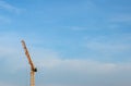 Yellow crane working for construction Royalty Free Stock Photo