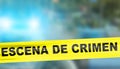 Yellow crime scene cordon tape in Spanish