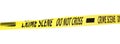 Yellow crime scene tape isolated on white Royalty Free Stock Photo