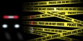 Yellow crime scene tape is seen. Police line do not cross Royalty Free Stock Photo