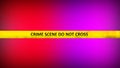 A yellow crime scene tape with the words CRIME SCENE DO NOT CROSS