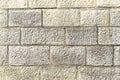 Yellow crimean sawn limestone - traditional porous heat-insulating stone for walls, hedges and construction in Feodosia Royalty Free Stock Photo