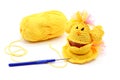 Yellow crochet chicken egg cup for Easter on white isolated back Royalty Free Stock Photo