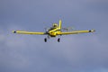 Yellow crop duster aircraft