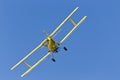 Yellow Crop Duster Spraying Pestisides On Crops Royalty Free Stock Photo