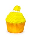 Yellow cupcake with macaroon Royalty Free Stock Photo