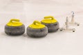 Yellow Curling Stones with Stabilizer Bar