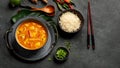 Yellow curry with chicken in bowl on dark background Royalty Free Stock Photo