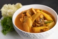 Yellow curry with snakehead fish, Thai food in a bowl on a plate Royalty Free Stock Photo