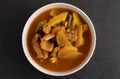 Yellow curry with snakehead fish, Thai food in a bowl on a plate Royalty Free Stock Photo