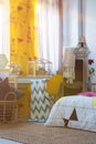 Yellow curtain in artistic bedroom