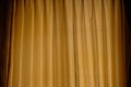 The yellow curtain texture hits the light from outside Royalty Free Stock Photo