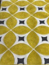 Yellow curved diamond hand tufted carpet Royalty Free Stock Photo