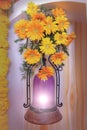 Yellow dahlia flower bouquet on purple wall lamp Royalty Free Stock Photo