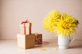 Yellow dahlias and gift boxes Royalty Free Stock Photo