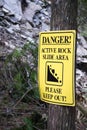 Yellow Danger Please Keep Out Rock Slide Royalty Free Stock Photo