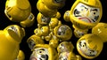 Yellow daruma dolls on black background