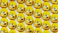 Yellow Daruma dolls on white background.