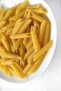 Yellow delicious pasta close-up on a white plate Royalty Free Stock Photo