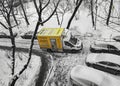 Yellow delivery van on a snowy day